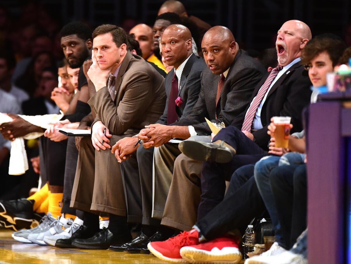 Lakers Coach Byron Scott and members of his coaching staff look on from the bench during a game against the Grizzlies on Feb. 26.