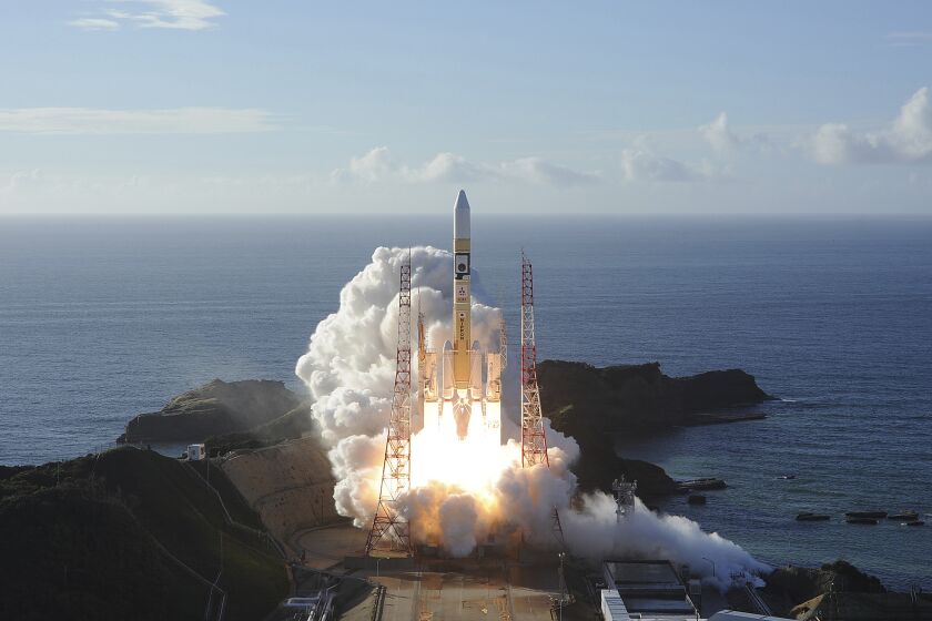 In this photo released by MHI, an H-IIA rocket with United Arab Emirates' Mars orbiter Hope lifts off from Tanegashima Space Center in Kagoshima, southern Japan Monday, July 20, 2020. A United Arab Emirates spacecraft rocketed away Monday on a seven-month journey to Mars, kicking off the Arab world’s first interplanetary mission. (MHI via AP)