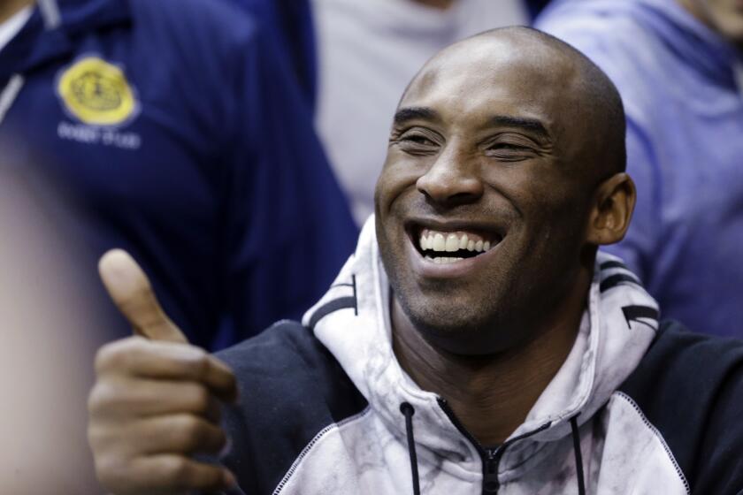 Los Angeles Laker Kobe Bryant, shown here at an NCAA game in January, is the subject of a documentary that will air on Showtime in November.