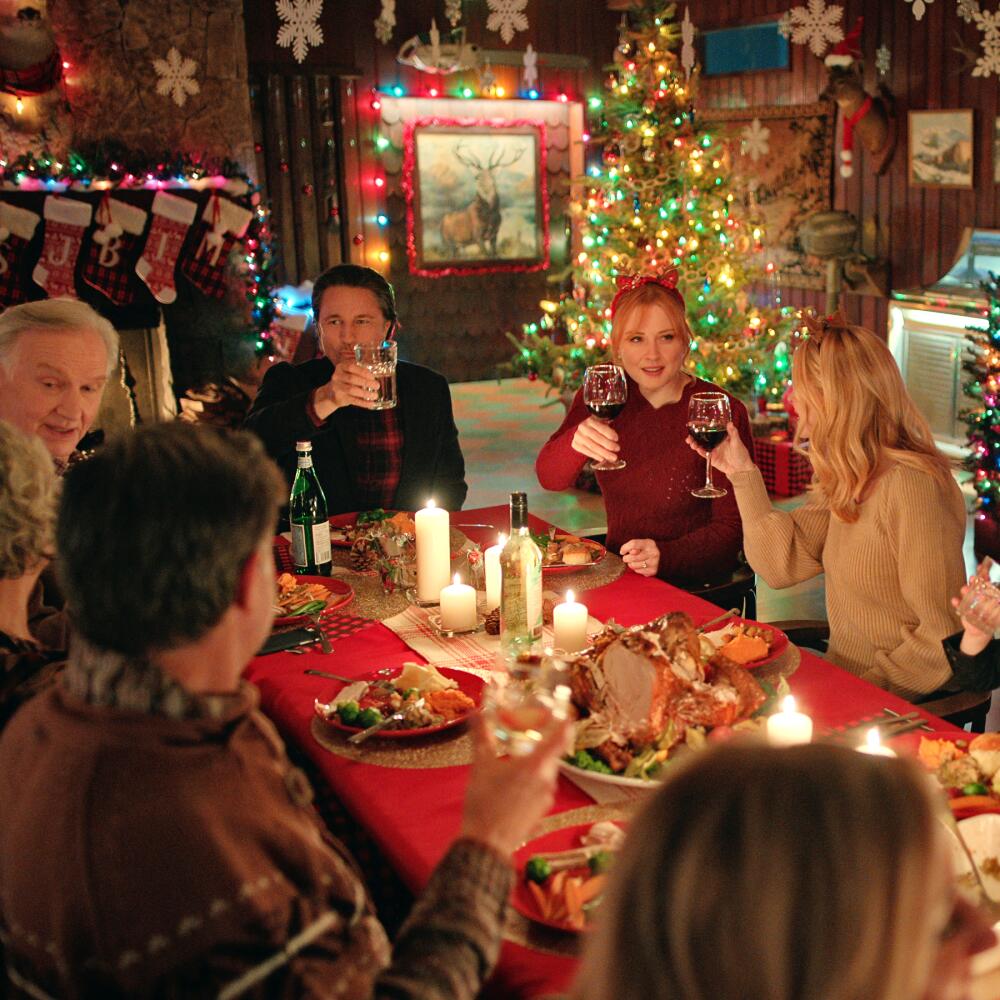 Characters from "Virgin River" sit for Christmas dinner.