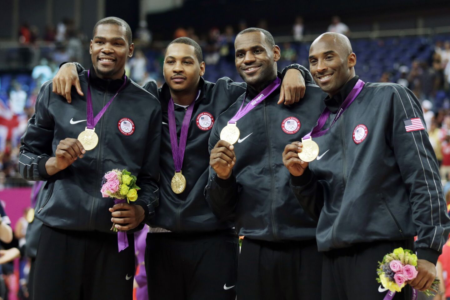 Team USA players, from left, Kevin Durant, Carmelo Anthony, LeBron James and Kobe Bryant with their gold medals at the 2012 Olympics.