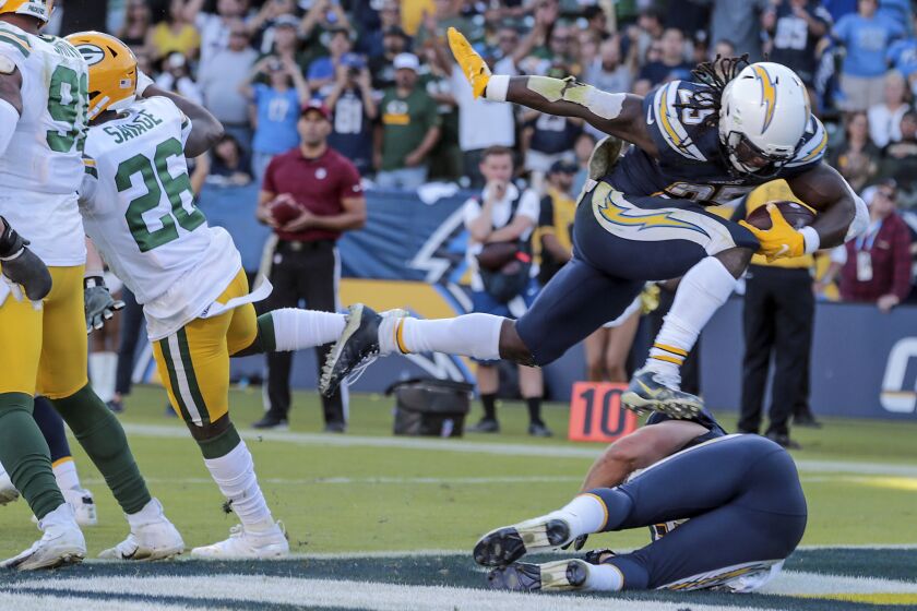 CARSON, CA, SUNDAY, NOVEMBER 3, 2019 - Los Angeles Chargers running back Melvin Gordon (25) leaps into the end zone for a third quarter touchdown against the Packers at Dignity Health Sports Park. (Robert Gauthier/Los Angeles Times)
