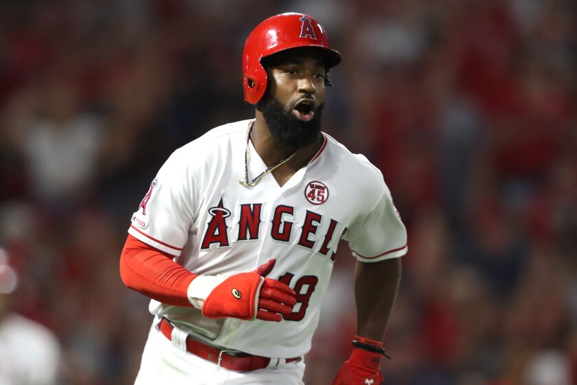 ANAHEIM, CALIFORNIA - AUGUST 31: Brian Goodwin #18 of the Los Angeles Angels of Anaheim reacts after hitting a two-run RBI single during the eighth inning of a game against the Boston Red Sox at Angel Stadium of Anaheim on August 31, 2019 in Anaheim, California. (Photo by Sean M. Haffey/Getty Images)