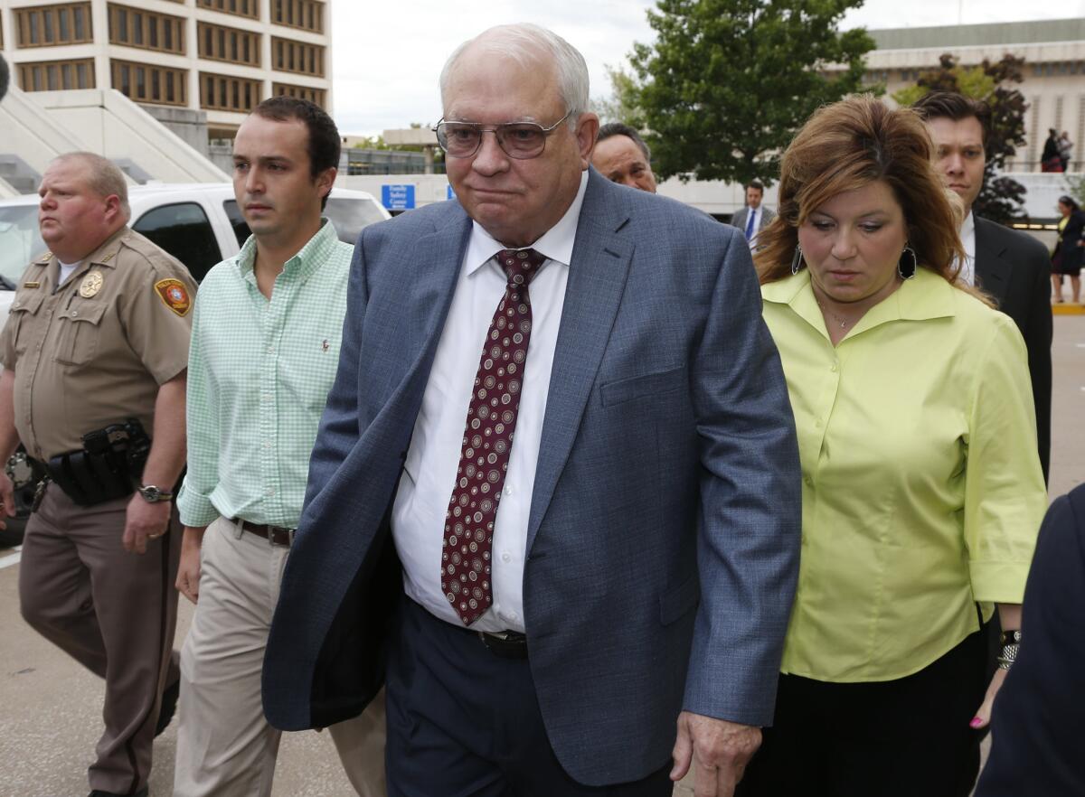 Robert Bates, center, after his arraignment last year.
