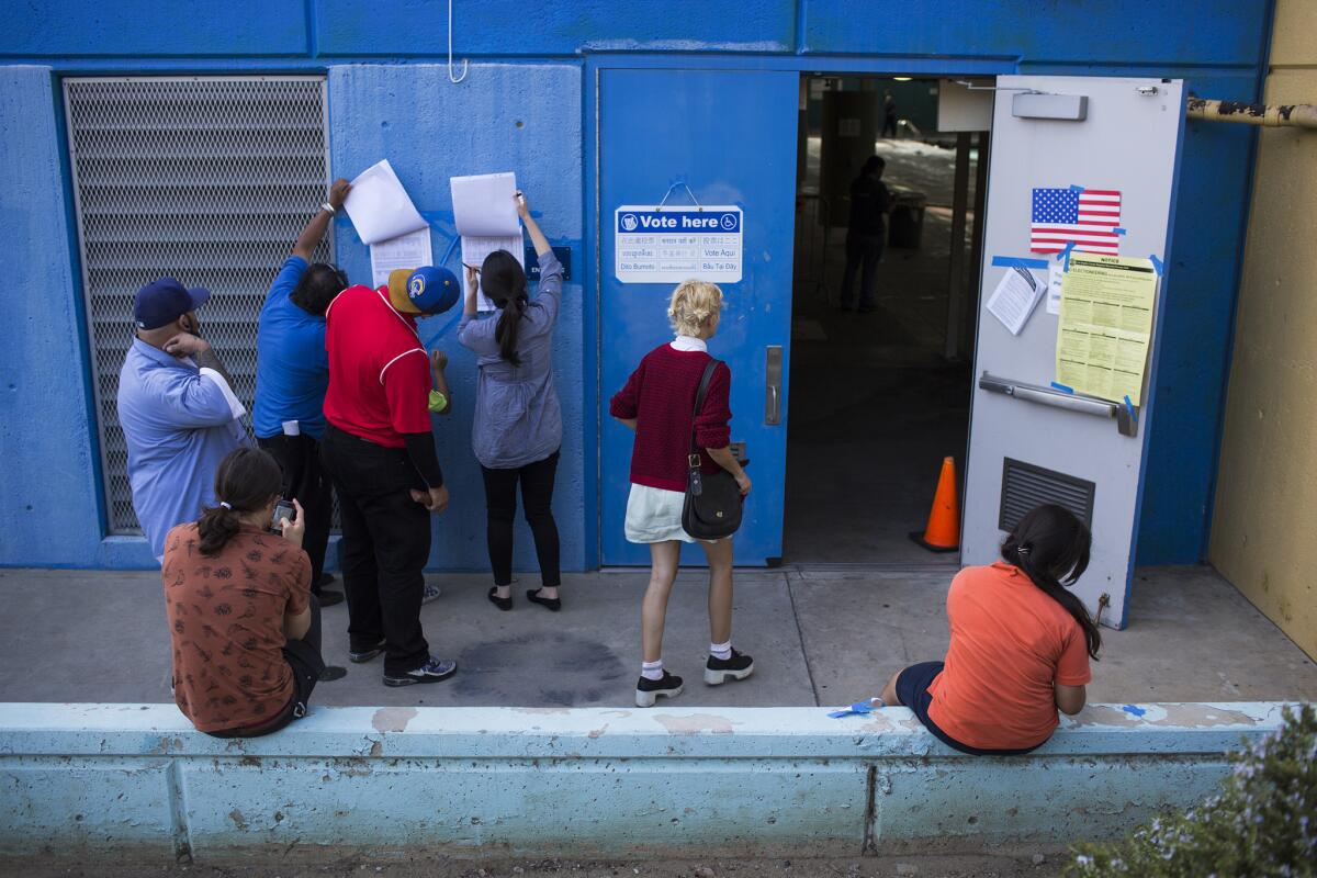Voters at a polling place in Los Angeles in June.