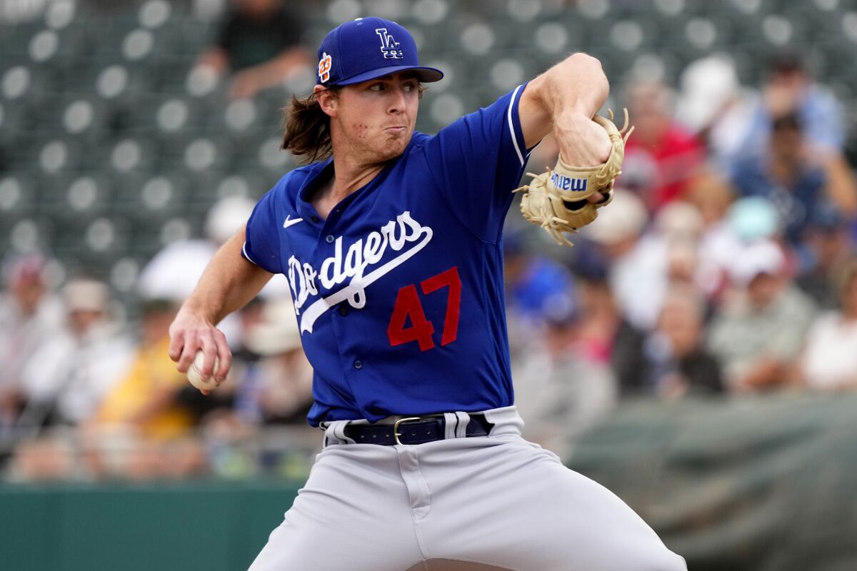 Dodgers pitcher Ryan Pepiot throws against the Oakland Athletics on March 9 in Mesa, Ariz.