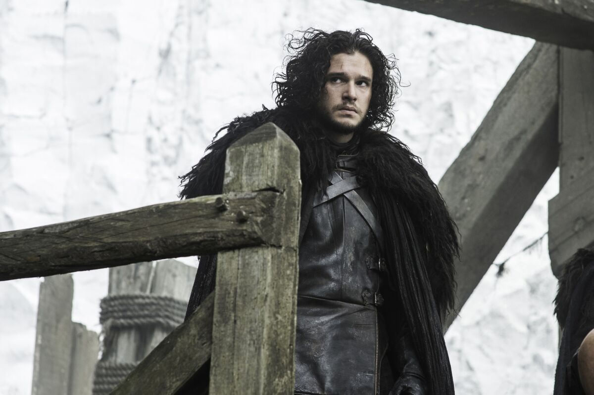 Night's Watch hero Jon Snow (Kit Harington) strives to protect the Wildling clans and their leader on the "Game of Thrones" season premiere.