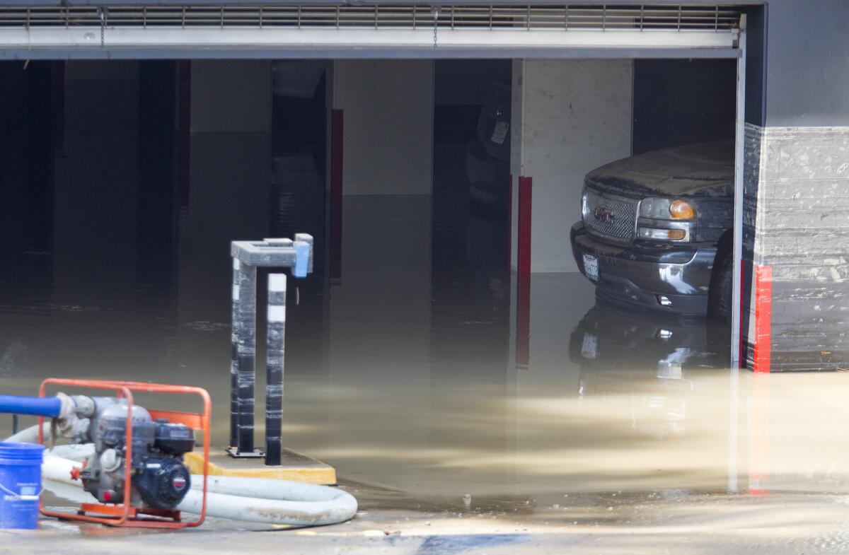A water main break in Newport Beach spilled an estimated million gallons of water into the street and an underground parking structure early Wednesday morning.