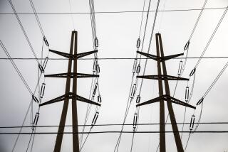 HERMOSA BEACH, CA - July 13: Overhead electric power lines photographed with a tilt-shift lens, in Hermosa Beach, CA, Tuesday, July 13, 2021. (Jay L. Clendenin / Los Angeles Times)