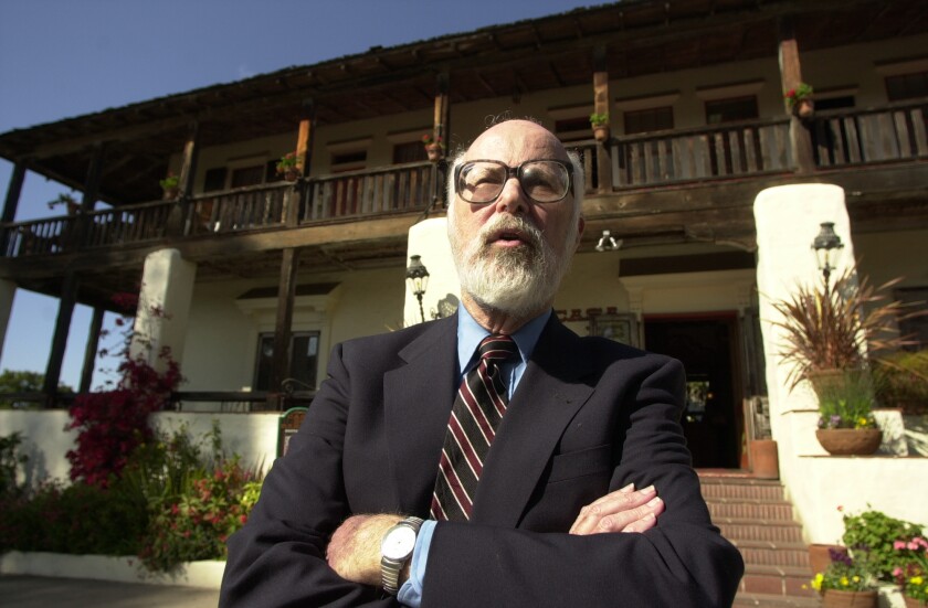 Former Senator, James Mills, stands outside of the Casa de Bandini restaurant in Old Town.  UT/CRISSY PASCUAL April 12, 2001