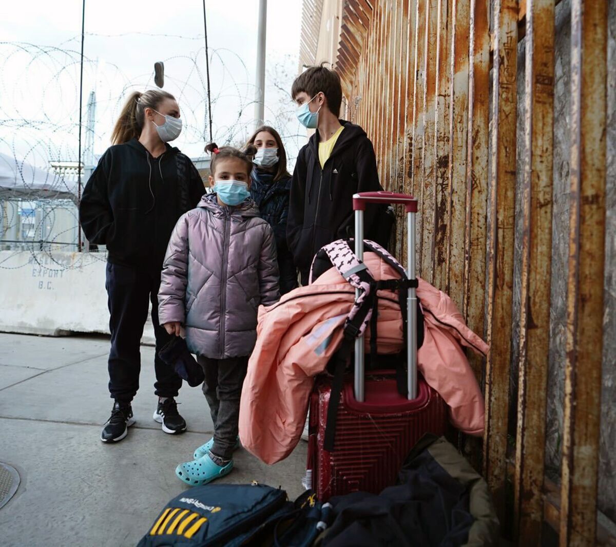 A Ukrainian family waits to enter the United States on Wednesday, March 8. 2022.