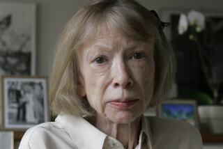 Author Joan Didion sits in her New York apartment on Sept. 26, 2005.