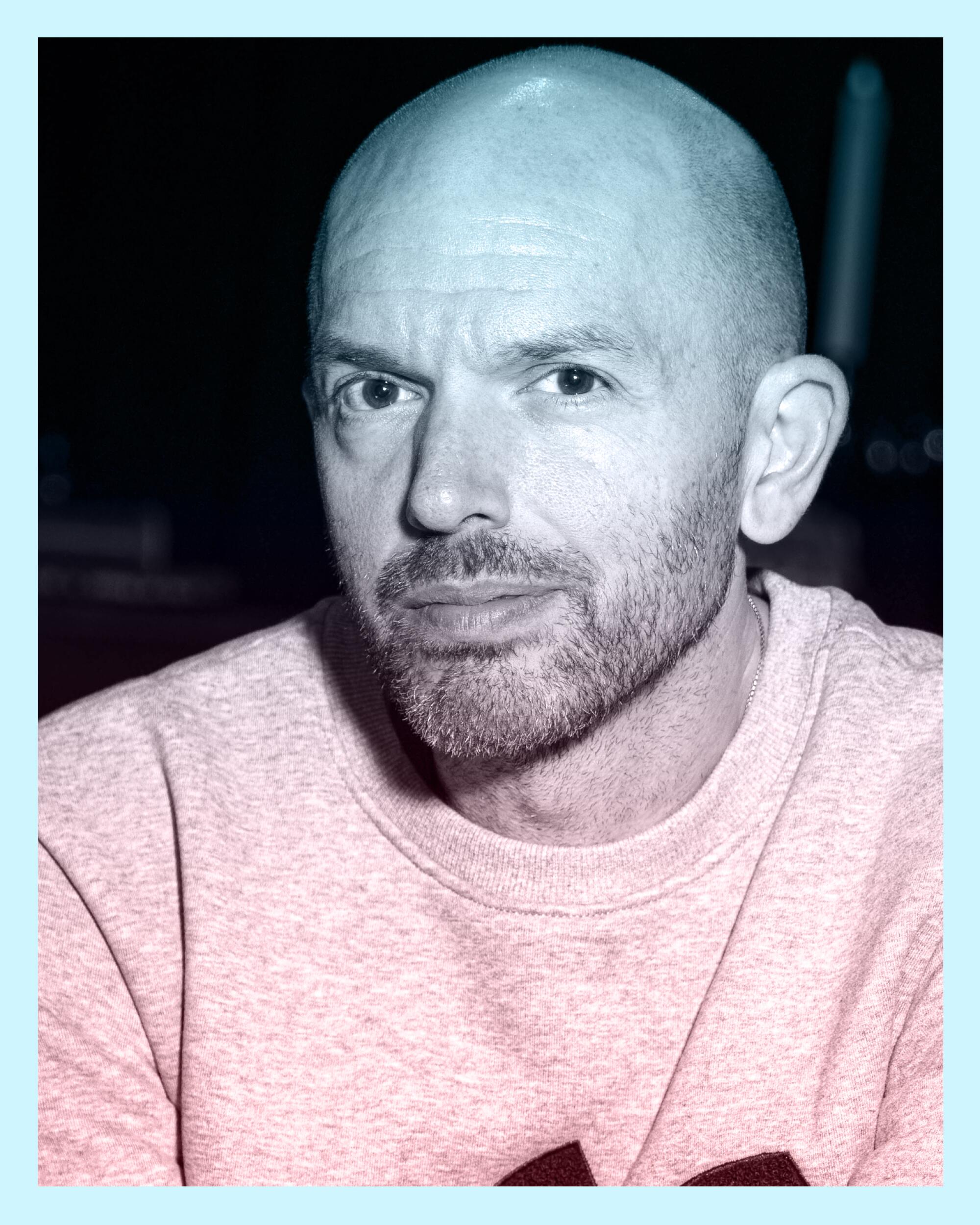 Paul Scheer with a bald head and scraggly beard and mustache