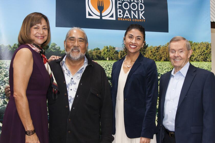 Second Harvest CEO Claudia Bonilla Keller, A.G. Kawamura, Dareen Khatib and Bob Whiton.
