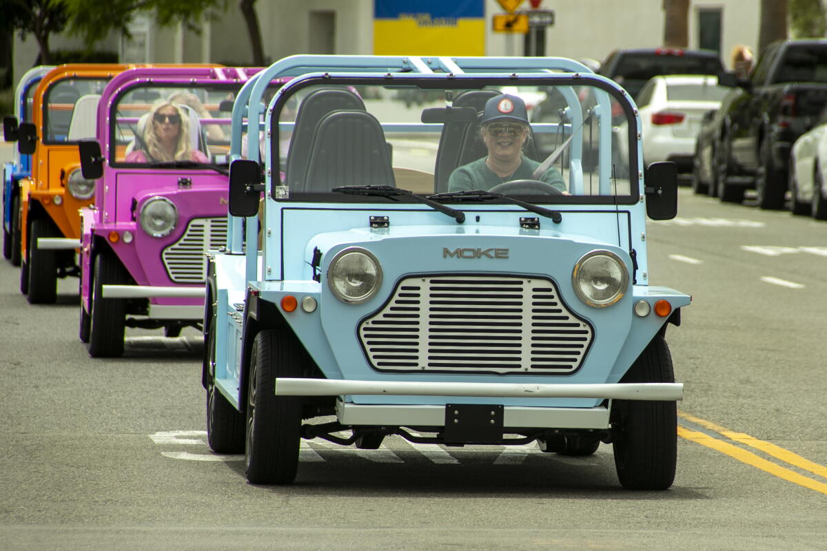 Morke Car Rentals 'You almost feel like you're on parade:' Mokes offer locals, tourists a ...