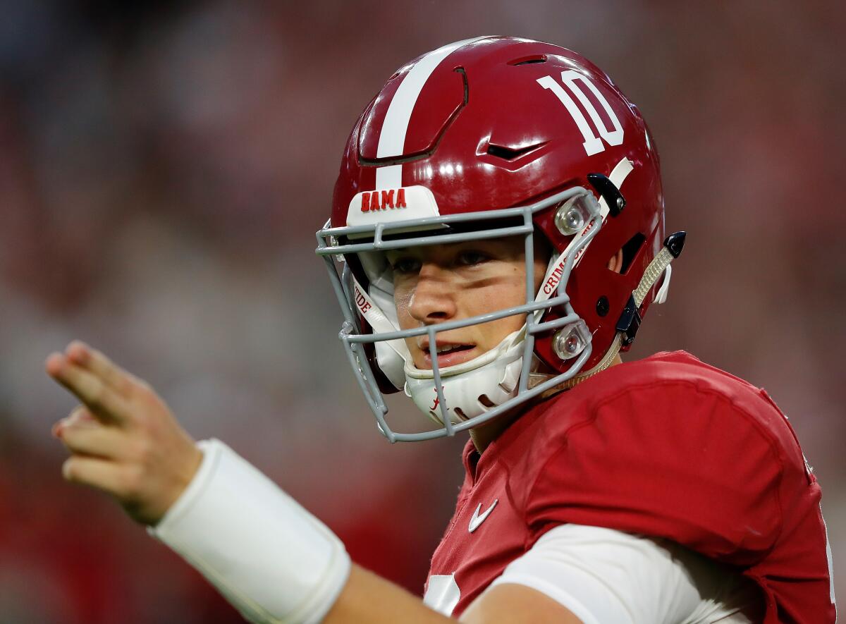 Alabama quarterback Mac Jones warms up before a game against Arkansas on Oct. 26 at Bryant-Denny Stadium.