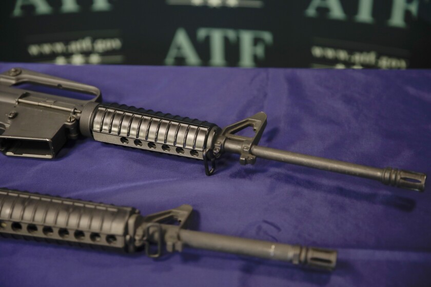 FILE - Homemade rifles are displayed on a table at an ATF field office in Glendale, Calif., on Aug. 29, 2017. The California Assembly approved, on Monday June 27, 2022, Texas-style lawsuits over illegal guns, mimicking the Lone Star State's law aimed at deterring abortions and obliquely linking the two most controversial U.S. Supreme Court decisions from last week. (AP Photo/Jae C. Hong, File)