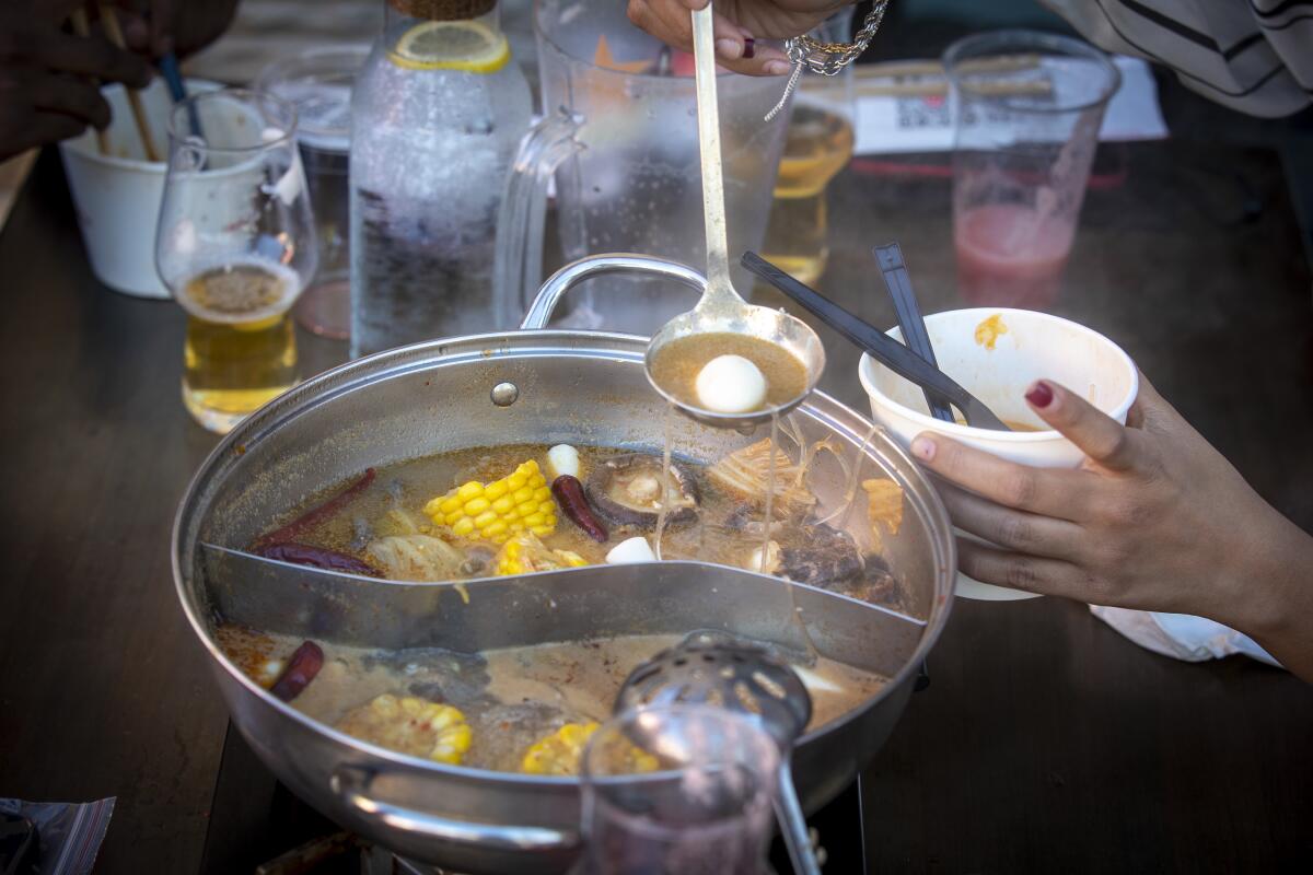 Hot pot dining at Hai Di Lao in Arcadia.