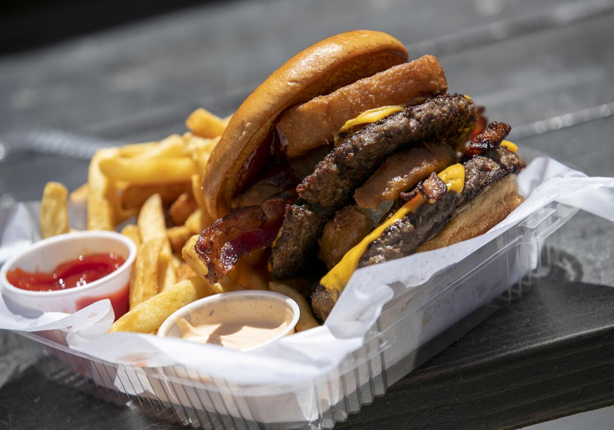 The bacon beach burger is one of the many items on the menu at the Huntington Beach House.