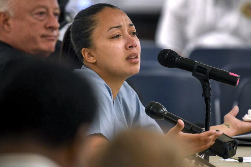 File- This May 23, 2018, file photo shows Cyntoia Brown appearing in court during her clemency hearing at the Tennessee Prison for Women in Nashville, Tenn. Several Democratic Tennessee lawmakers are urging Republican Gov. Bill Haslam to grant clemency to a woman convicted of first-degree murder as a teen. Newly elected Nashville Sen. Brenda Gilmore led a group Friday, Dec. 14, 2018, calling for 30-year-old Browns freedom. (Lacy Atkins/The Tennessean via AP, Pool, File)