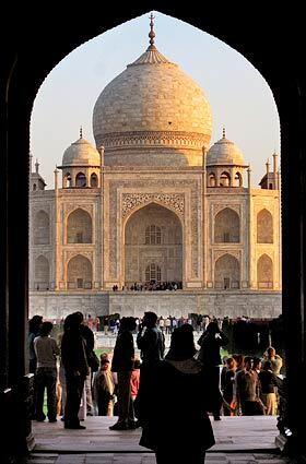 The onion-domed Taj, as seen through an archway.