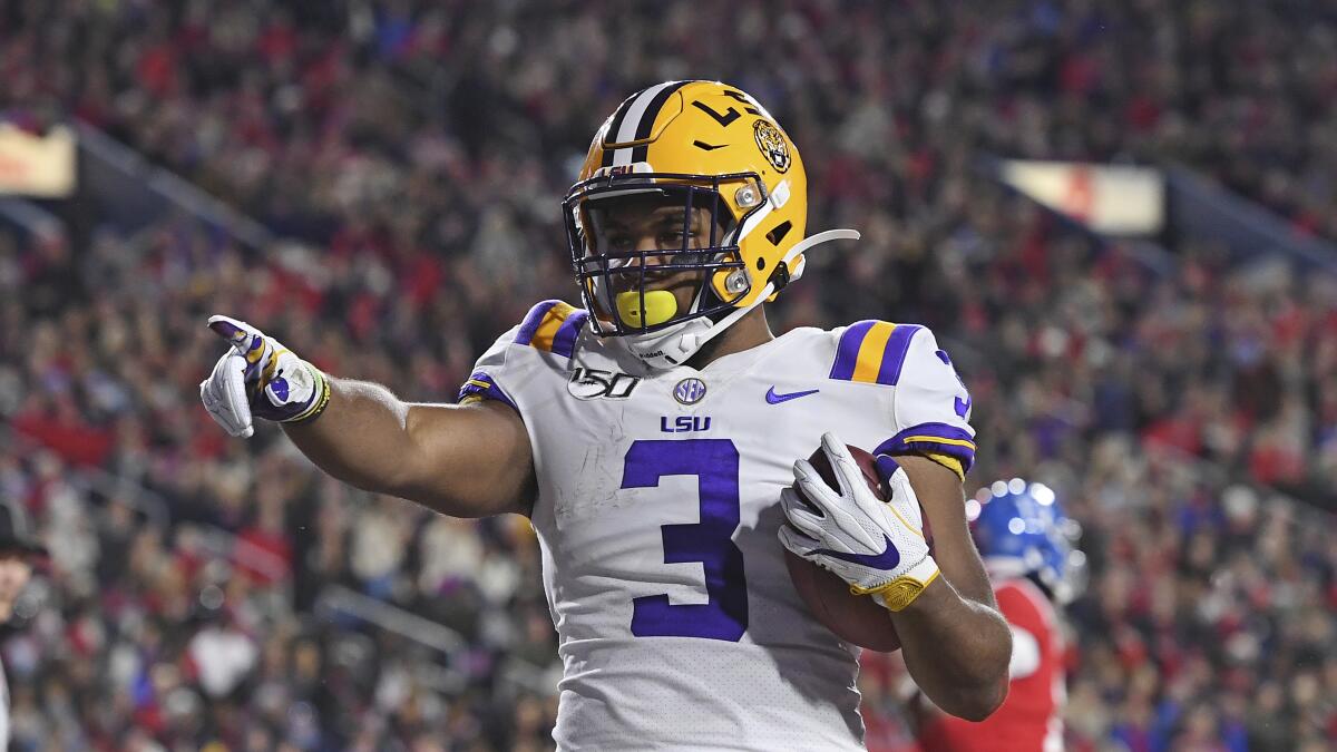 LSU running back Tyrion Davis-Price reacts after a touchdown during the first half against Mississippi on Saturday.