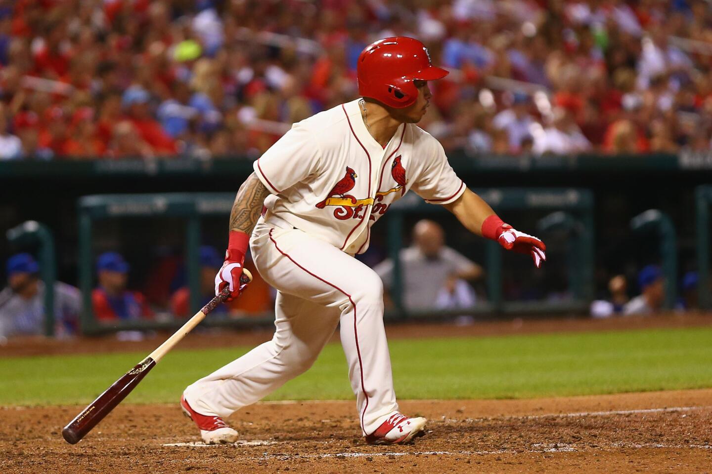 Kolten Wong hits an RBI single in the eighth inning.