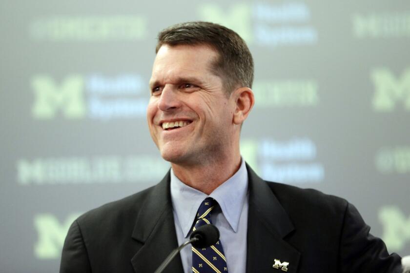 New Michigan Coach Jim Harbaugh after being introduced at a news conference Tuesday in Ann Arbor, Mich.