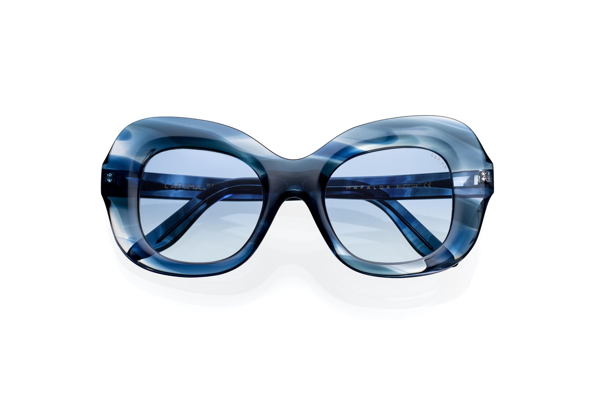 Lapima sunglasses have a thick curvy frame.