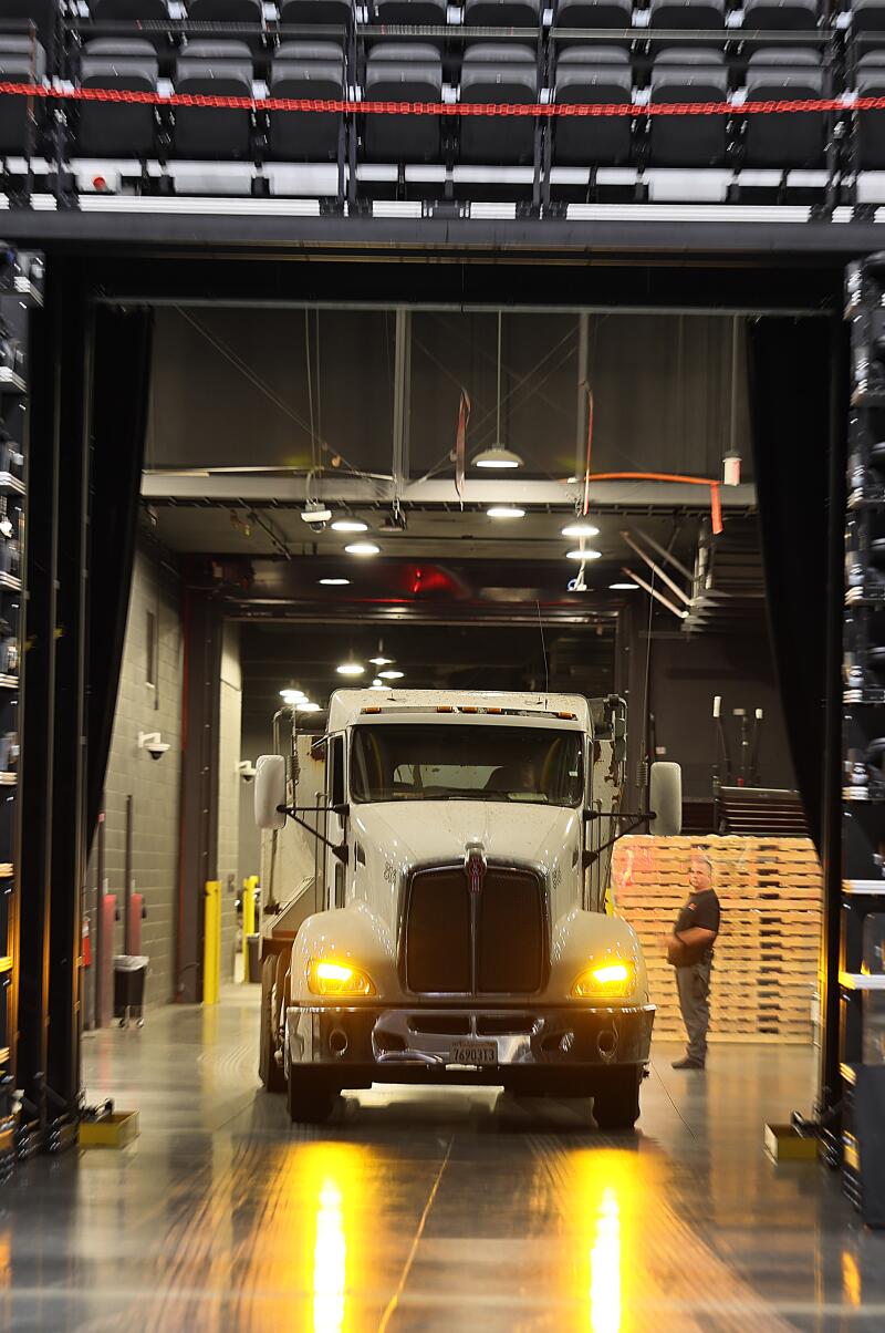 Inglewood, CA - July 10: A truck arrives to unload one of many carrying 300 tons.