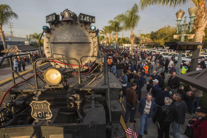 Spectators at the Covina Metrolink Station view the historic locomotive, Union Pacific's Big Boy No. 4014, on Sunday.