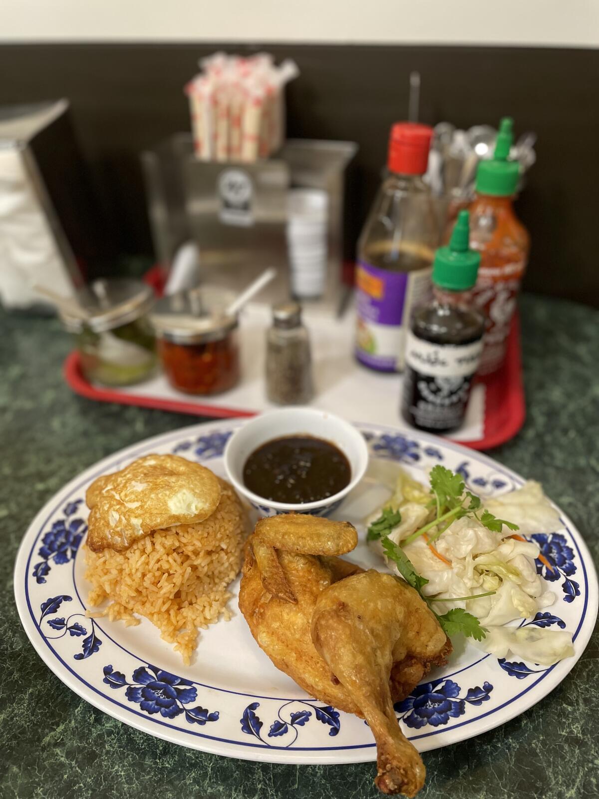 Cơm gà chiên, fried chicken with rice, at Nha Hang, a Vietnamese restaurant.