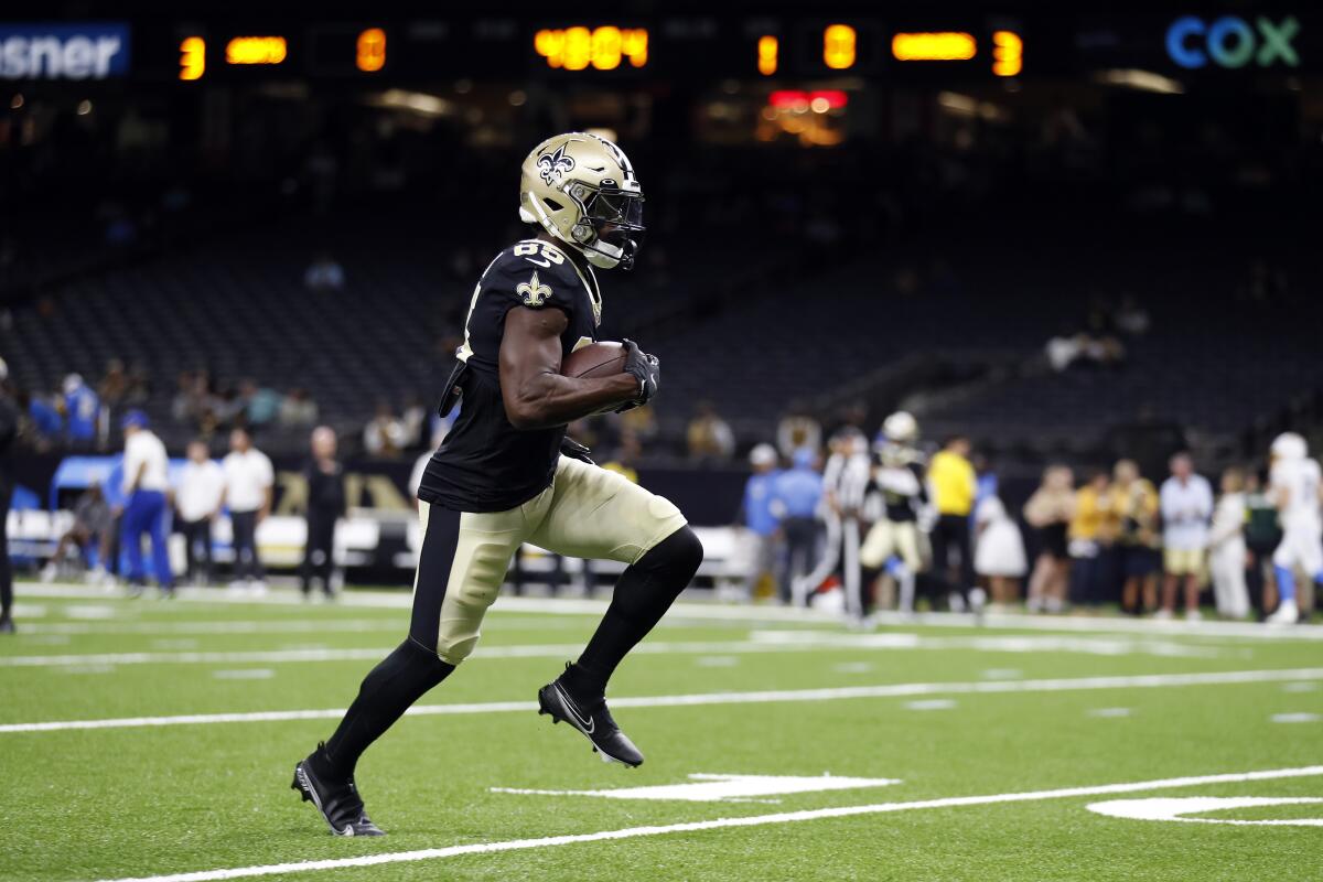 New Orleans Saints wide receiver Kirk Merritt warms up before a preseason game.