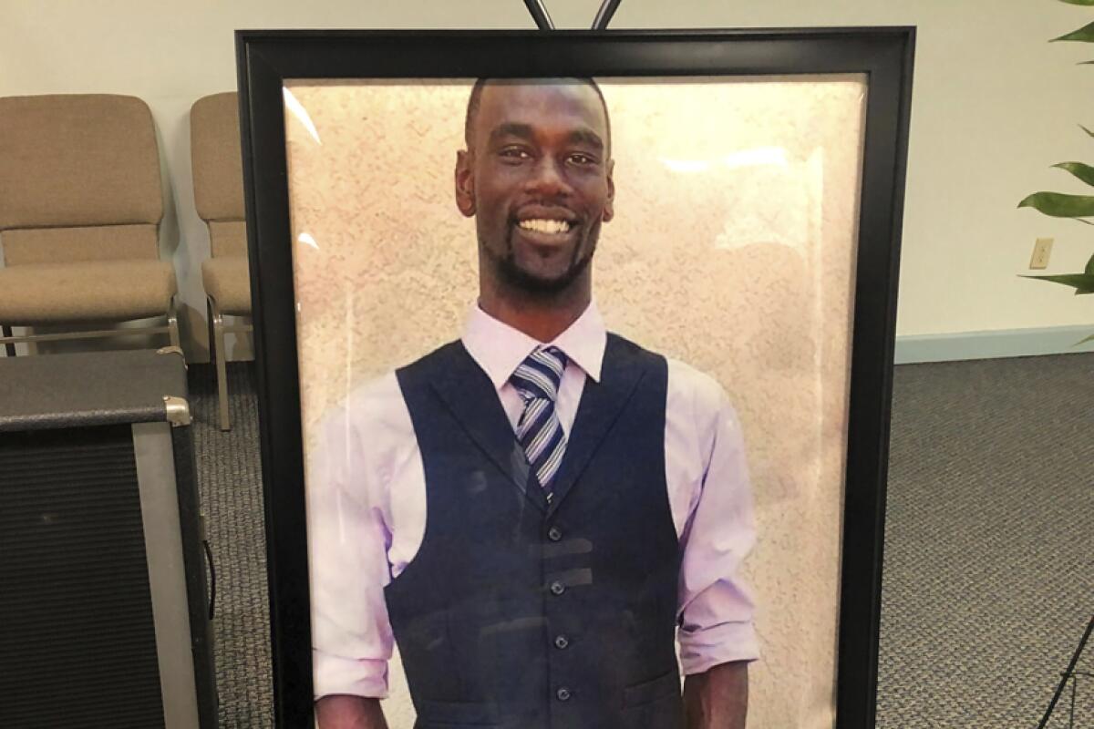 A portrait of Tyre Nichols is displayed at a memorial service for him on Tuesday in Memphis 