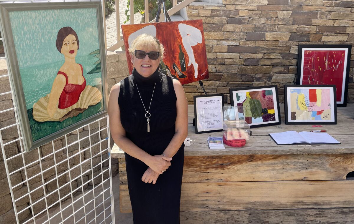 Artist Cecilia Anastos displays some of her art at Turtle Rock Ridge Vineyard Winery.
