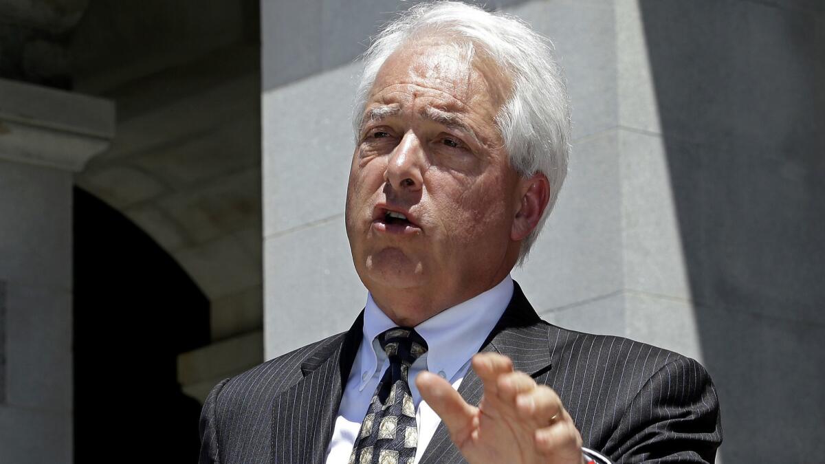 Republican gubernatorial candidate John Cox speaks at a news conference in Sacramento on June 18.