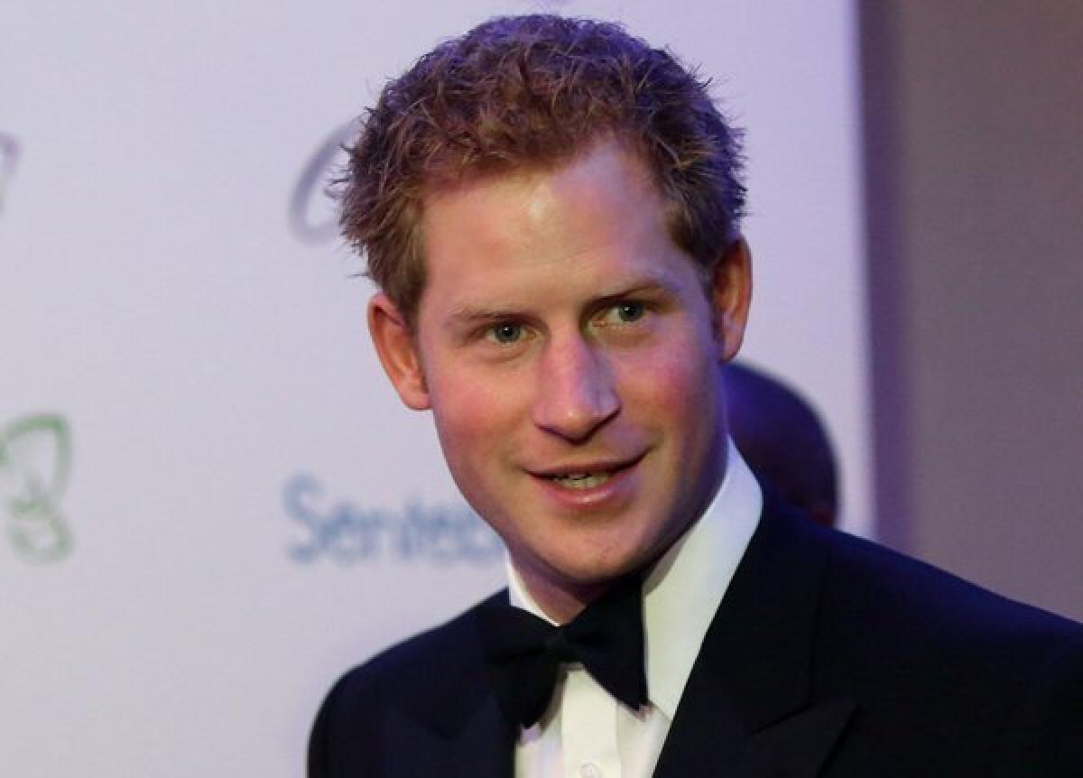 Britain's Prince Harry arrives to attend the Sentable "Forget Me Not" dinner in Dubai.