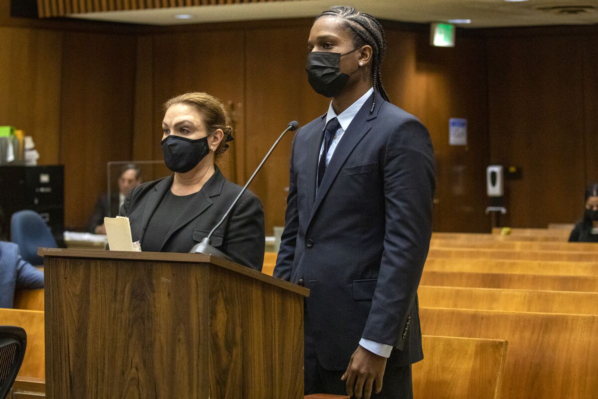 Rapper A$AP Rocky, right, appears in a Los Angeles Superior courtroom on Wednesday, Aug. 17, 2022, and pleaded not guilty to assault charges stemming from a November 2021 run-in with a former friend in Hollywood. The rapper, whose real name is Rakim Mayers, remains free on $550,000 bond and is due back in court Nov. 2, 2022. (Irfan Khan/Los Angeles Times via AP, Pool)