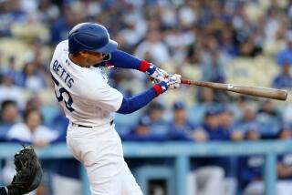LOS ANGELES, CA - JUNE 02: Los Angeles Dodgers right fielder Mookie Betts (50) homers to left off.