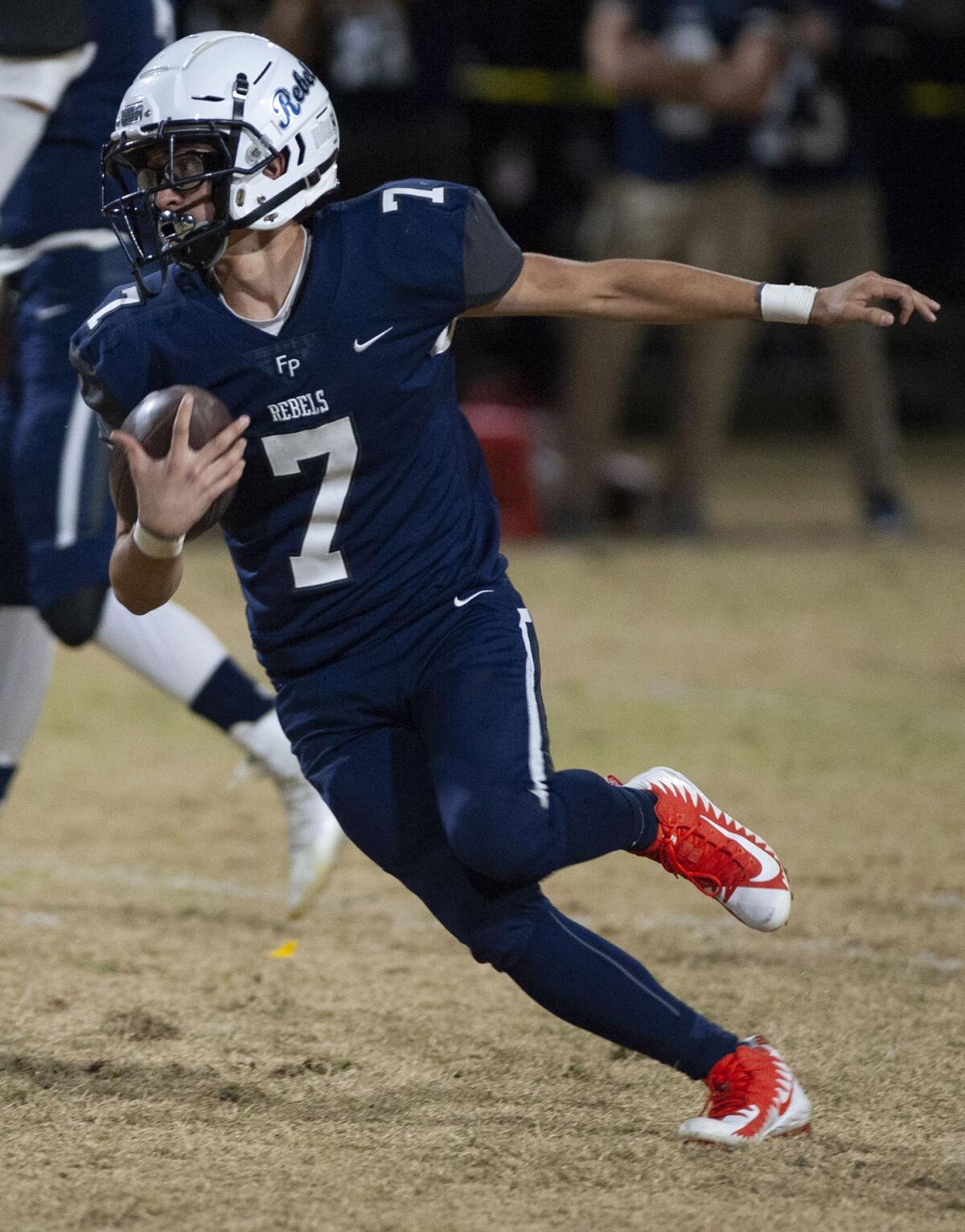 Flintridge Prep’s Alexander Payne runs the ball during Friday's CIF Southern Section Division I playoff game against PAL Academy at Flintridge Prep. (Photo by Miguel Vasconcellos)
