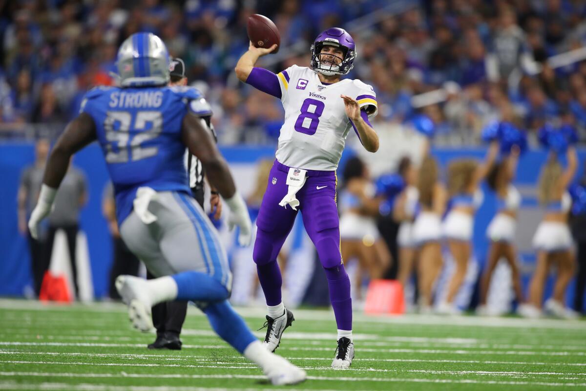 Minnesota Vikings quarterback Kirk Cousins throws a pass during the second half of Sunday's win over the Detroit Lions.