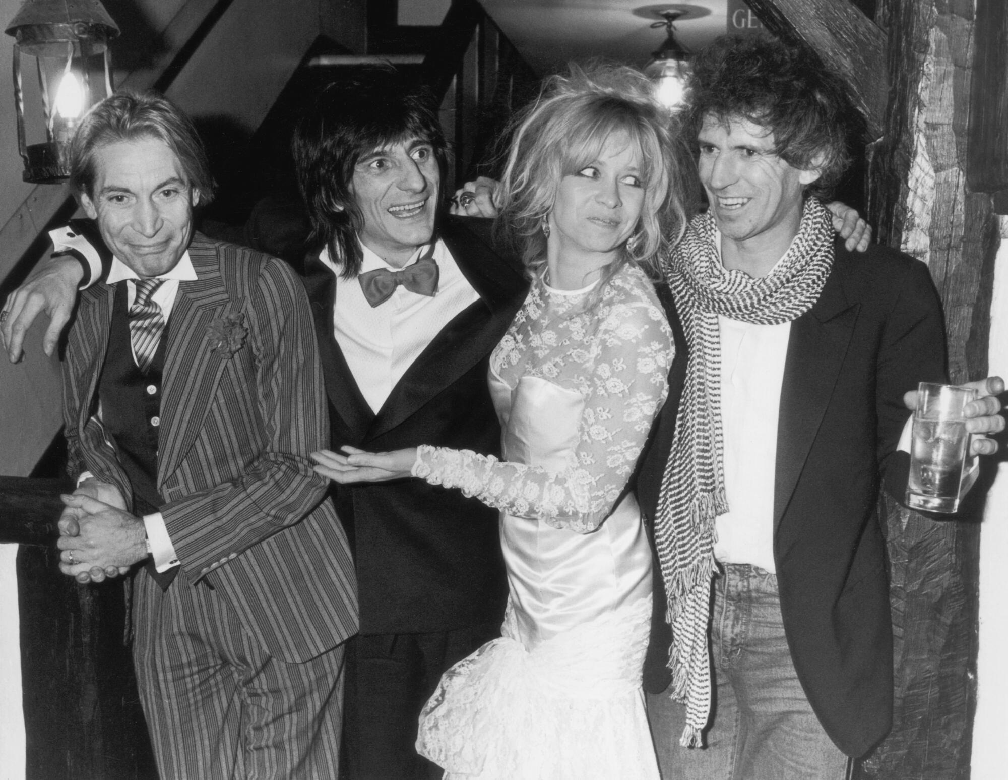 Best men Charlie Watts and Keith Richards flank just-married Ronnie Wood and Jo Howard in 1985.