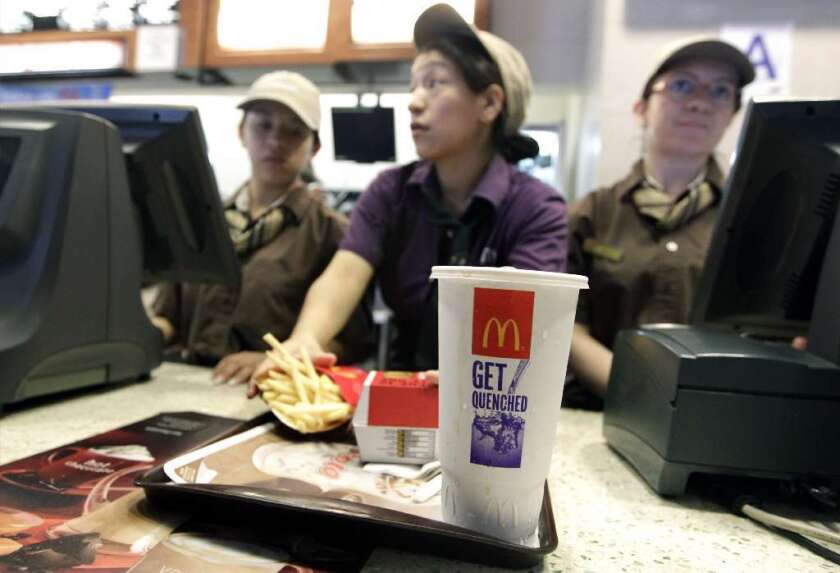 Reminding people how many calories they should eat at lunch did not persuade diners to order lower-calorie meals at McDonald's. In fact, it seemed to backfire, researchers found.