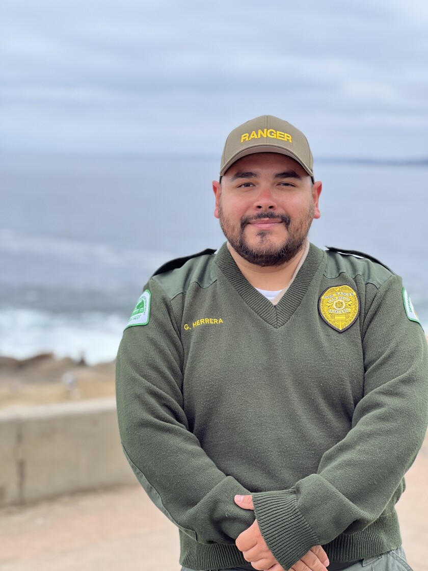 New park ranger aide Gilbert Herrera says he loves talking to people at Point La Jolla.