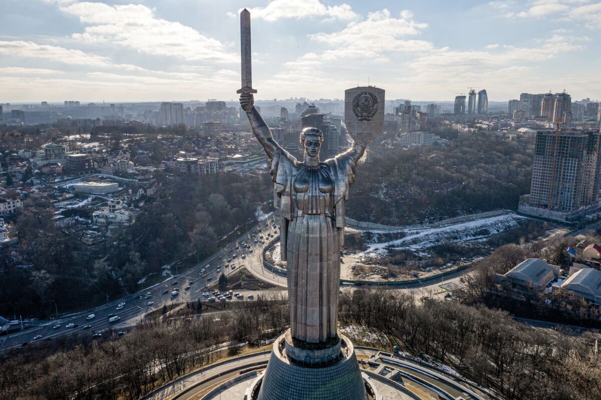 The Motherland Monument, photographed in February 2022, rises high above Kyiv.