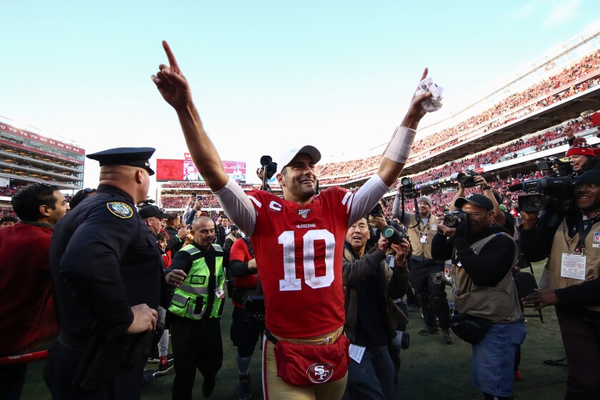 Jimmy Garoppolo celebrates after the 49ers' victory over the Vikings on Jan. 11 in an NFC divisional playoff game at Levi's Stadium.