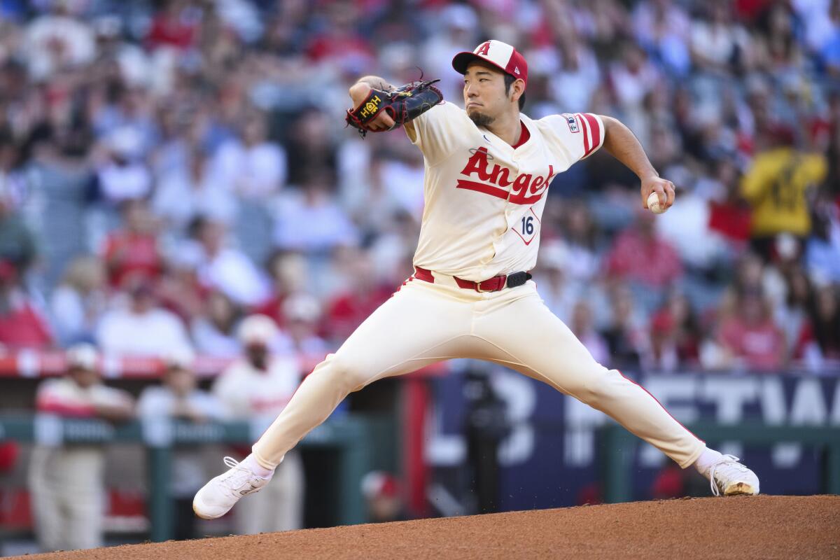 Angels pitcher Yusei Kikuchi delivers during the first inning of a 3-2 loss to the Houston Astros at Angel Stadium.