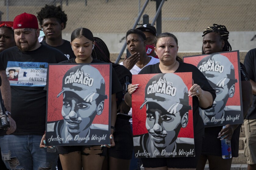 FILE- The family of Daunte Wright attend a rally and march organized by families who were victims of police brutality in in St. Paul, Minn.,Monday, May 24, 2021. The trial for the police officer accused of killing Daunte Wright starts Monday, Nov. 29. (AP Photo/Christian Monterrosa, File)