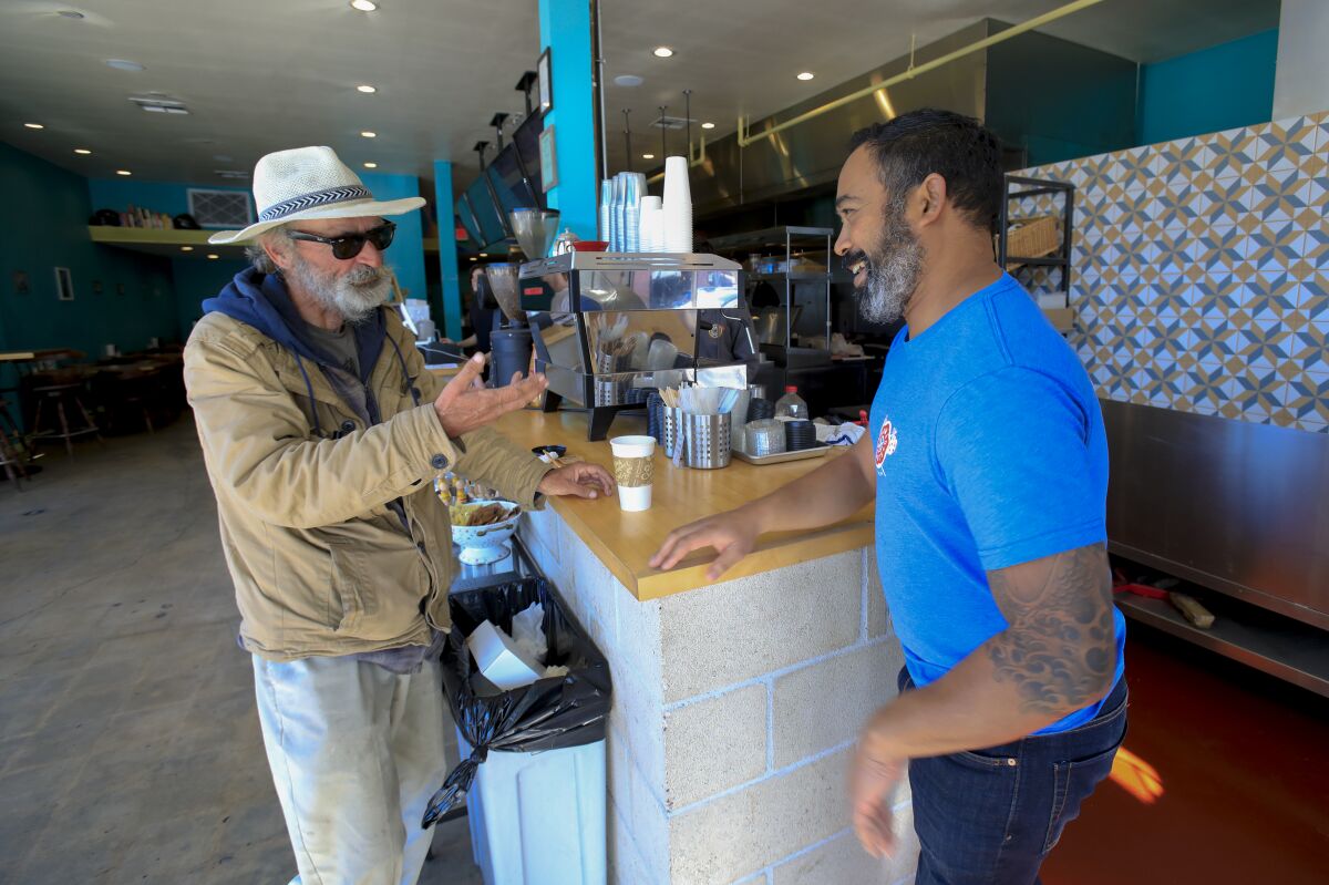 Ray Taylor, 58 has been homeless for the past eight years and for the past year or so has been hanging out next to Nomad Donuts in North Park. Brad Keiller, owner of Nomad Donuts, doesn't mind at all and often enjoys brief conversation with Taylor.