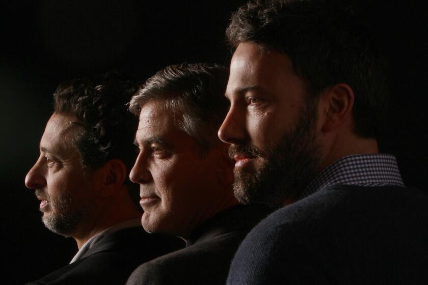 "Argo" producers Grant Heslov, George Clooney and producer-director-star Ben Affleck.